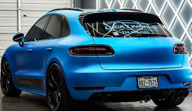 Matte blue Porsche Macan wrap with Lucky Wrapz branding
